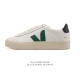 Frequently spotted in street style photos, the classic white Veja sneakers, a F
