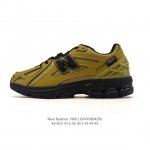 A corporate-grade New Balance M1906 retro sneaker, a treasured dad shoe. As one