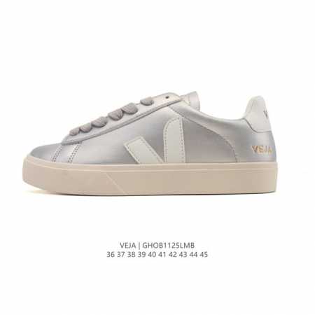 Frequently spotted in street style photos, the classic white Veja sneakers with - Click Image to Close