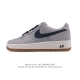 a company-grade Nike Air Force 1 '07 Low white sneaker with a thick sole and hei