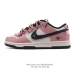 The Nike Dunk Low Retro sneaker features a deconstructed double-lace design. A c