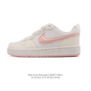 Nike Women's Court Borough Low Sneakers. 1. The leather upper combined with a m