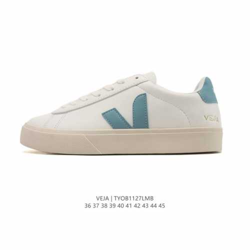 Frequently spotted in street style photos, the classic white Veja sneakers with