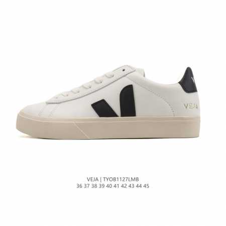 Frequently spotted in street style photos, the classic white Veja sneakers, a F - Click Image to Close