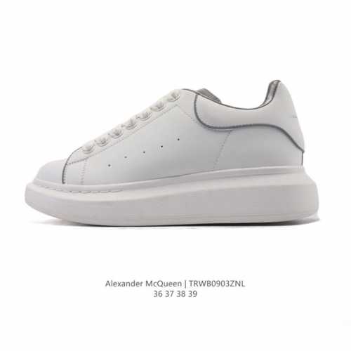 Alexander McQueen's white sneakers, featuring thick soles, height-enhancing gli
