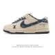The Nike Dunk Low Retro sneaker, a classic basketball shoe from the 80s, was in