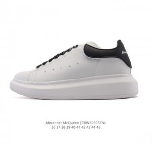 Alexander McQueen's white athletic shoes, featuring thick soles, height-enhanci