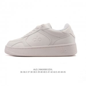 Company-level Alo Yoga Recovery Mode. Comfortable, minimalist white sneakers wit