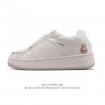 Company-level Alo Yoga Recovery Mode. Comfortable, minimalist white sneakers wit