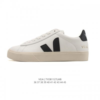 Frequently spotted in street style photos, the classic white Veja sneakers, a F