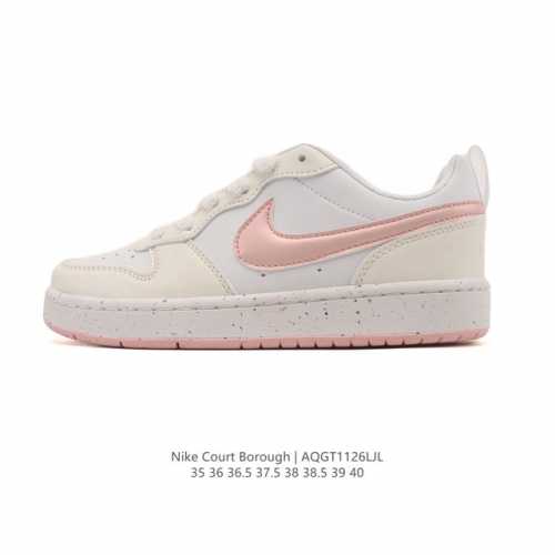 Nike Women's Court Borough Low Sneakers. 1. The leather upper combined with a m