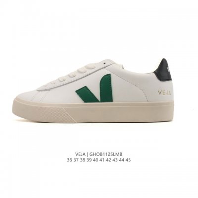Frequently spotted in street style photos, the classic white Veja sneakers, a F