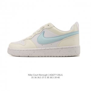 Nike Women's Court Borough Low Sneakers. 1. The leather upper combined with a m